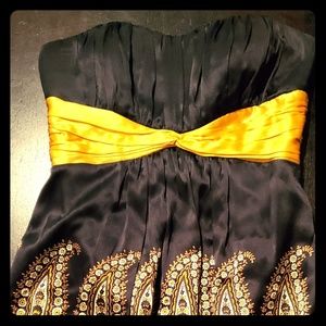 Bebe Black and Gold Strapless Mini Dress